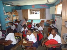 Handing out backpacks in Pandy Town.