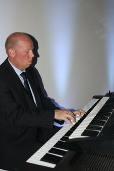 Mr. Bowman, Assistant Principal at Whitecourt Central, provides the entertainment for the evening.